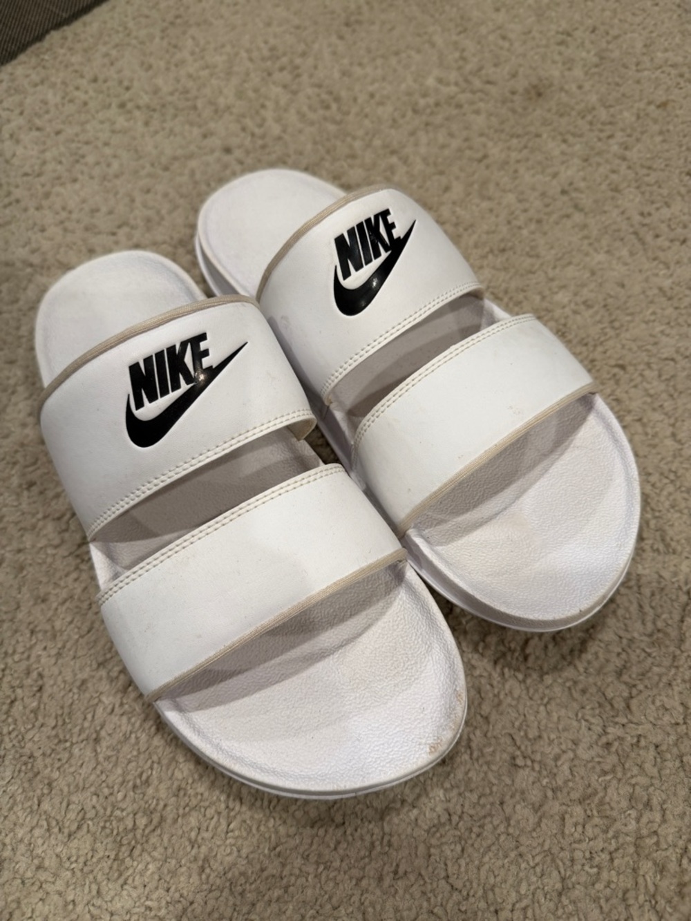 Nike White Double-Strap Slides with Black Swoosh